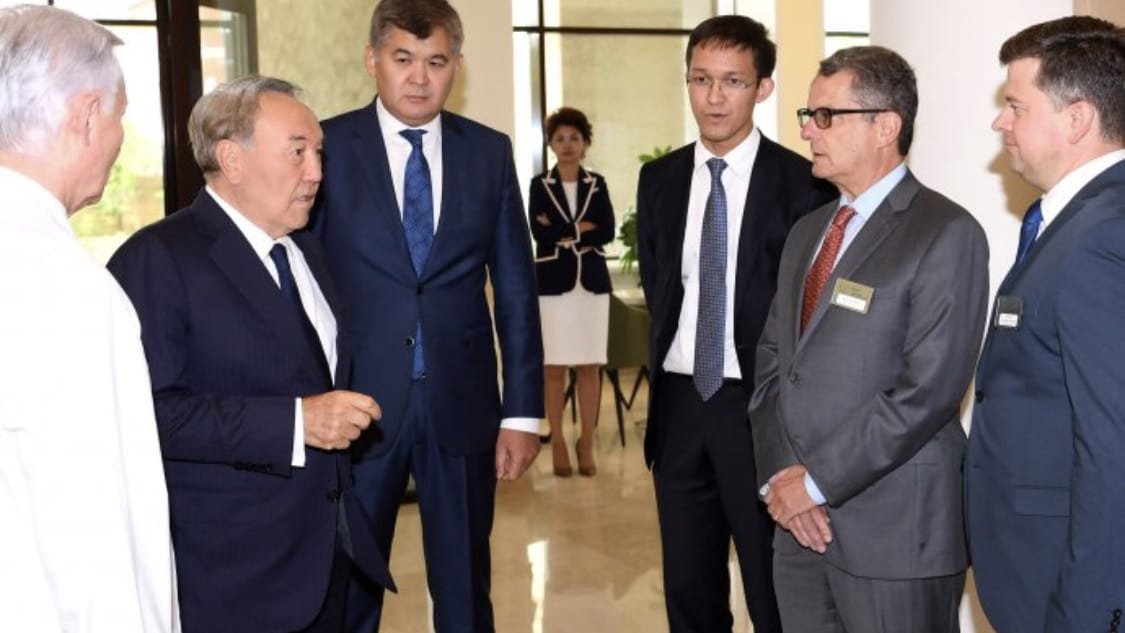 Dmitri Kudinov with Kazakhstan's then-President Nursultan Nazarbayev at the UMIT Centre opening